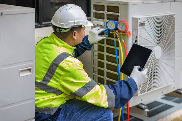 Professional Ductwork Repair technician working in Southport, NC